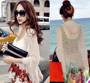 百搭时尚，夏日防晒新风尚——新款流苏镂空沙滩裙外罩衫
